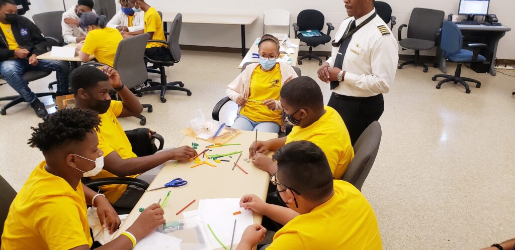 Kids around a table at ACE Academy in Chicago.